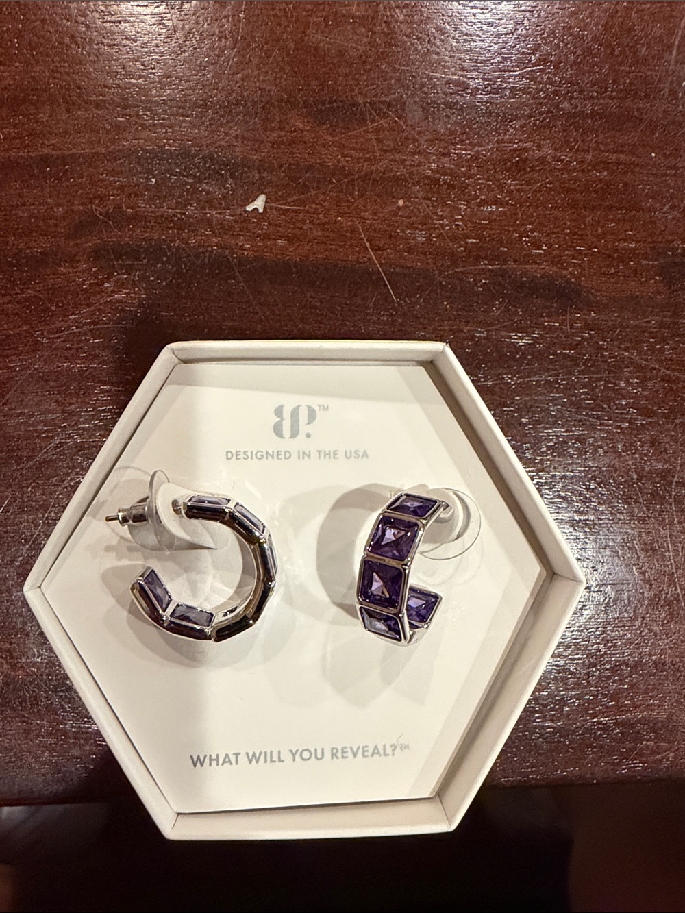 Cast in Still Grace: Purple Topaz on Rhodium